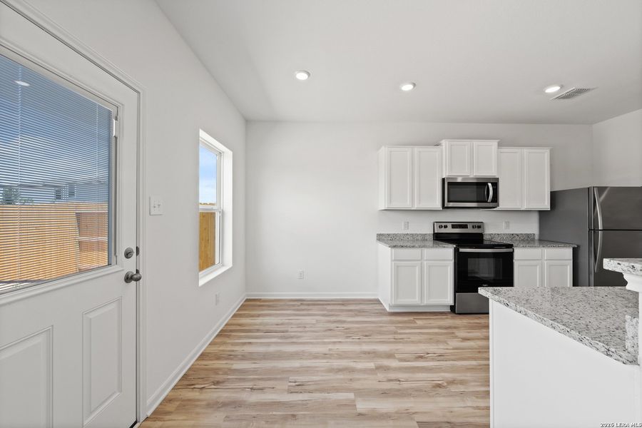 Furnished interior view inside a new home in , San Antonio (Image 9).