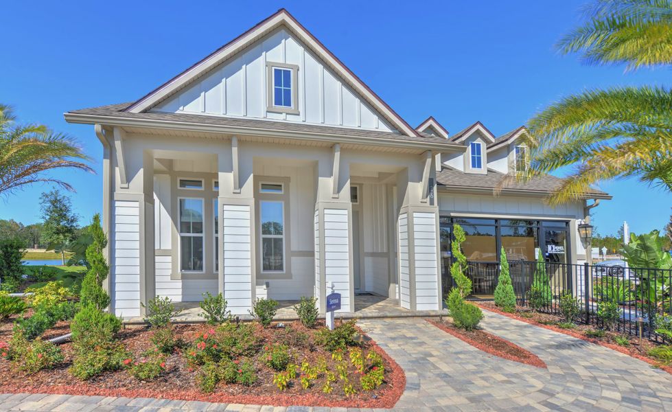 Front exterior of a new home in Courtney Chase, St. Augustine, FL, highlighting curb appeal (Image 1). Front exterior of a new home in Courtney Chase, St. Augustine, FL, highlighting curb appeal (Image 1).