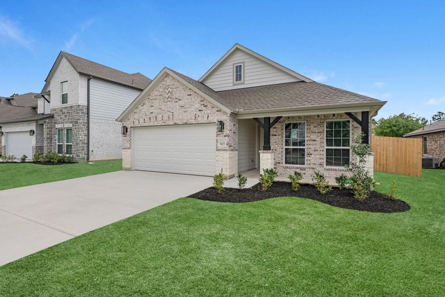 Front exterior of a new home in Barton Creek Ranch, Conroe, TX, highlighting curb appeal (Image 2). Front exterior of a new home in Barton Creek Ranch, Conroe, TX, highlighting curb appeal (Image 2).