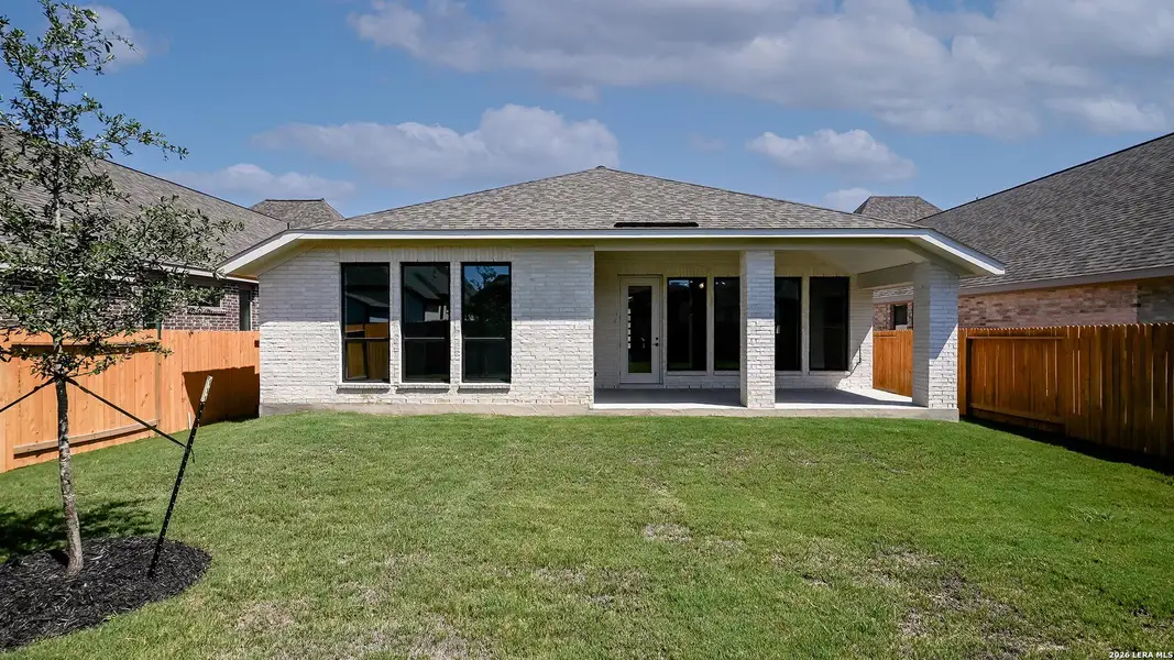 Exterior details and patio area of a home in Meadows of Mill Creek, Seguin (Image 3).
