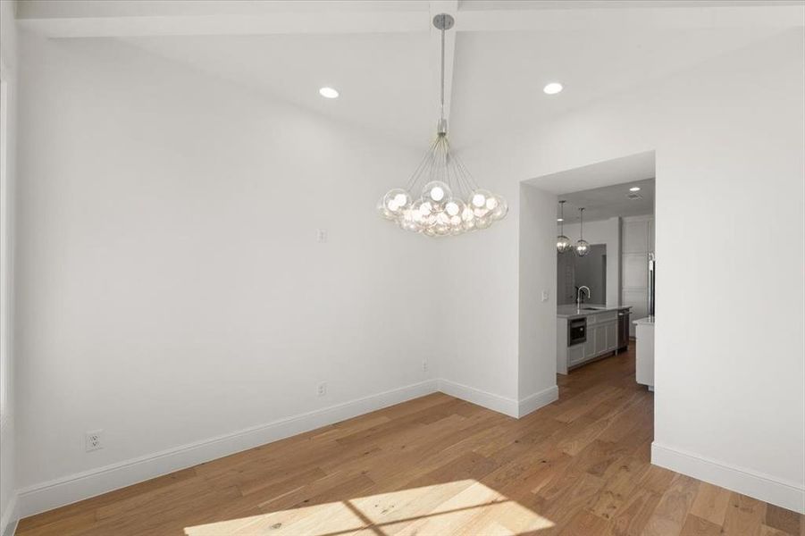 designer lighting and large enough for 10-12 around a round table