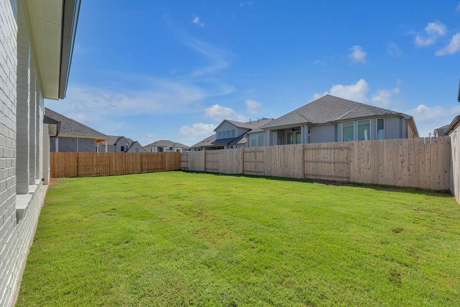 Exterior details and patio area of a home in Flora, Hutto (Image 29).