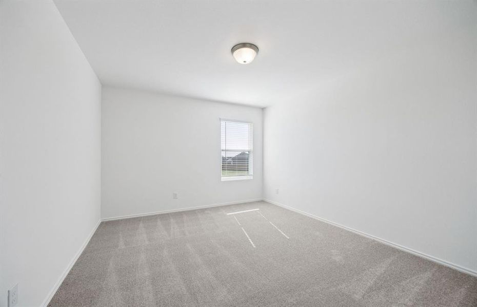 Secondary bedroom with large window Secondary bedroom with large window