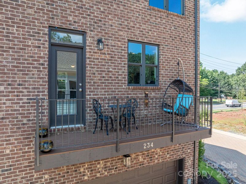 Front exterior of a new home in , Huntersville, NC, highlighting curb appeal (Image 22).