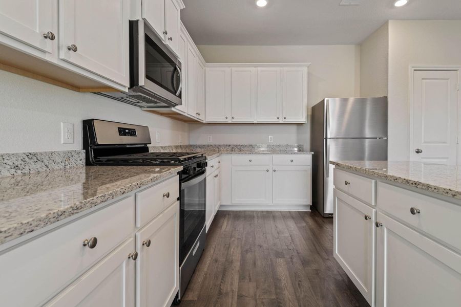 Furnished interior view inside a new home in Sweetwater Ridge, Conroe (Image 6).