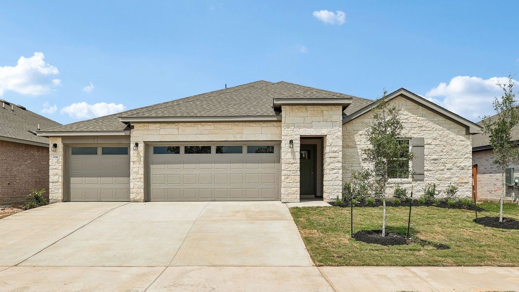 Front exterior of a new home in Riverview, Georgetown, TX, highlighting curb appeal (Image 2). Front exterior of a new home in Riverview, Georgetown, TX, highlighting curb appeal (Image 2).