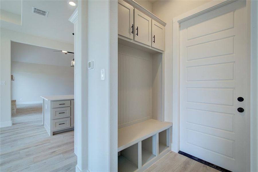 Mudroom featuring light hardwood / wood-style flooring