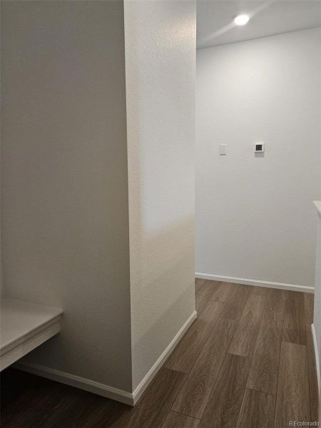 Spacious, unfurnished interior of a new home in The Cottages Collection at Ridgeline Vista, Brighton (Image 15).