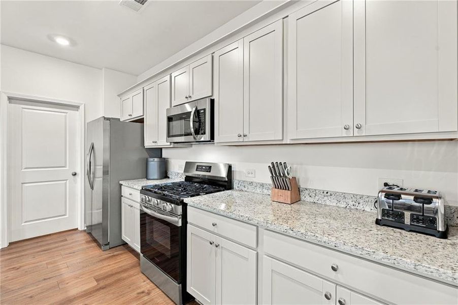 Furnished interior view inside a new home in Heritage Point, Hampton (Image 11).