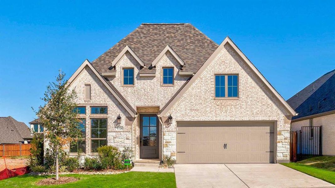 Front exterior of a new home in Hillstead 50', Lavon, TX, highlighting curb appeal (Image 1).
