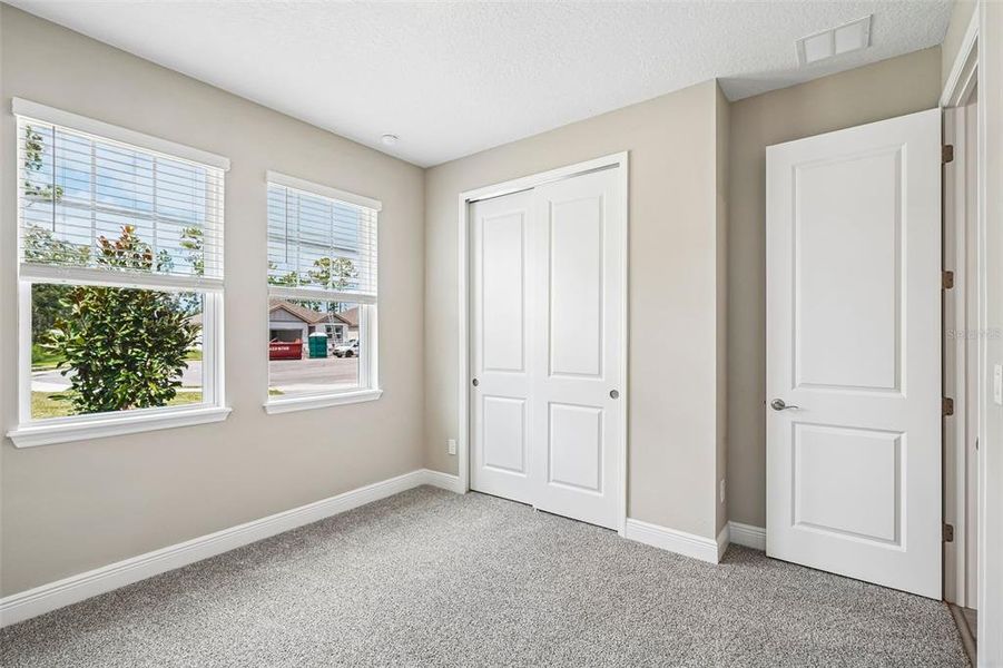 Spacious, unfurnished interior of a new home in Legends Preserve - Signature Series, Daytona Beach (Image 24).