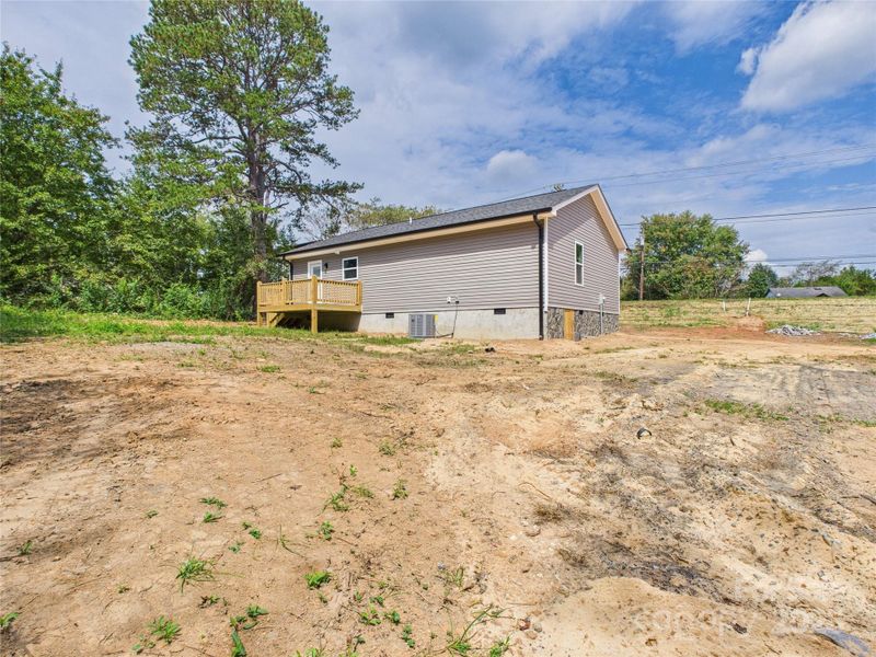 Front exterior of a new home in , Connelly Springs, NC, highlighting curb appeal (Image 2). Front exterior of a new home in , Connelly Springs, NC, highlighting curb appeal (Image 2).