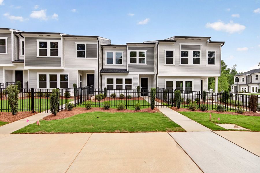 Front exterior of a new home in Amplitude, Charlotte, NC, highlighting curb appeal (Image 1). Front exterior of a new home in Amplitude, Charlotte, NC, highlighting curb appeal (Image 1).