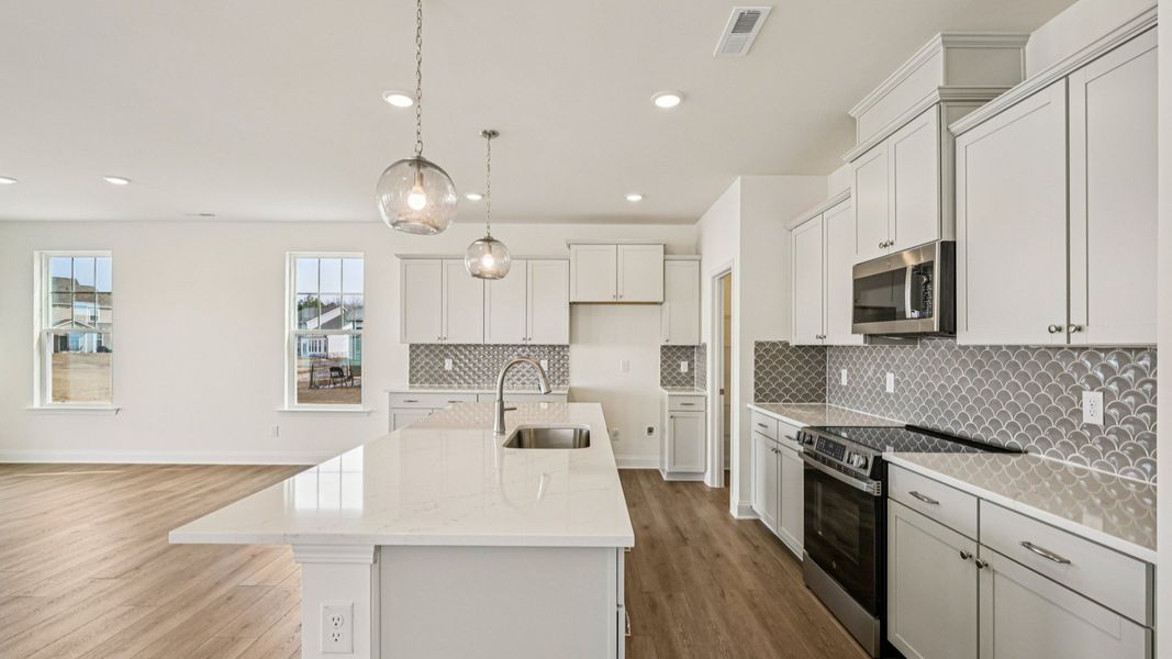 Representative furnished interior of a home built from the Juniper by DRB Homes in Essex Village, Franklinton (Image 16).