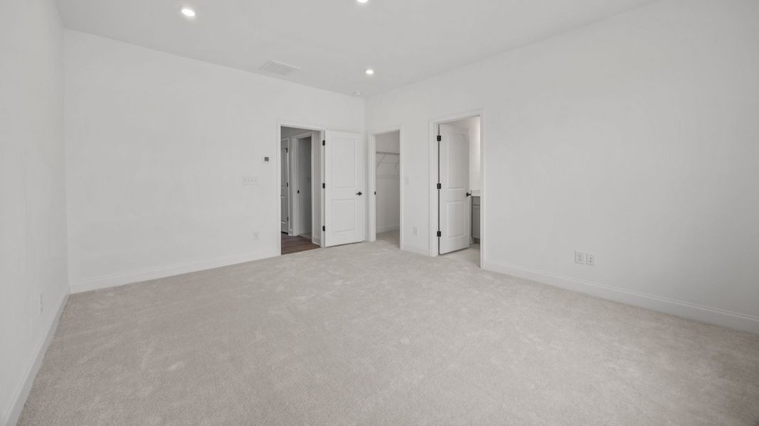 The Landon Plan in River District by DBR Homes in Charlotte, N.C - Primary bedroom