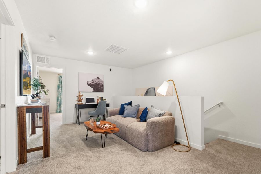 Furnished interior view inside a new home in Conestoga, Ault (Image 11).
