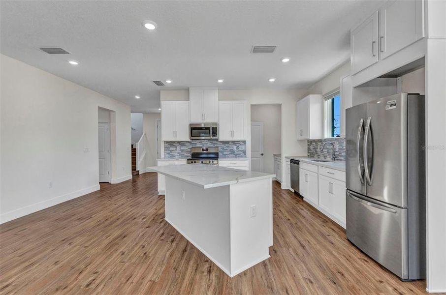 Furnished interior view inside a new home in , Port Charlotte (Image 11).