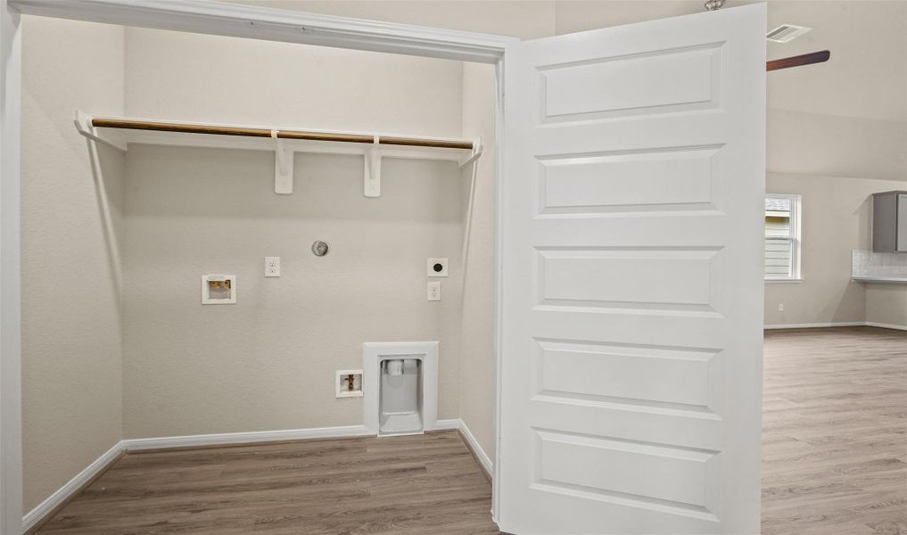 Laundry room (*Photo not of actual home and used for illustration purposes only.)