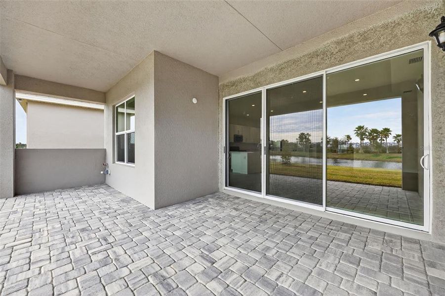 Exterior details and patio area of a home in Winding Ridge, Wesley Chapel (Image 20).