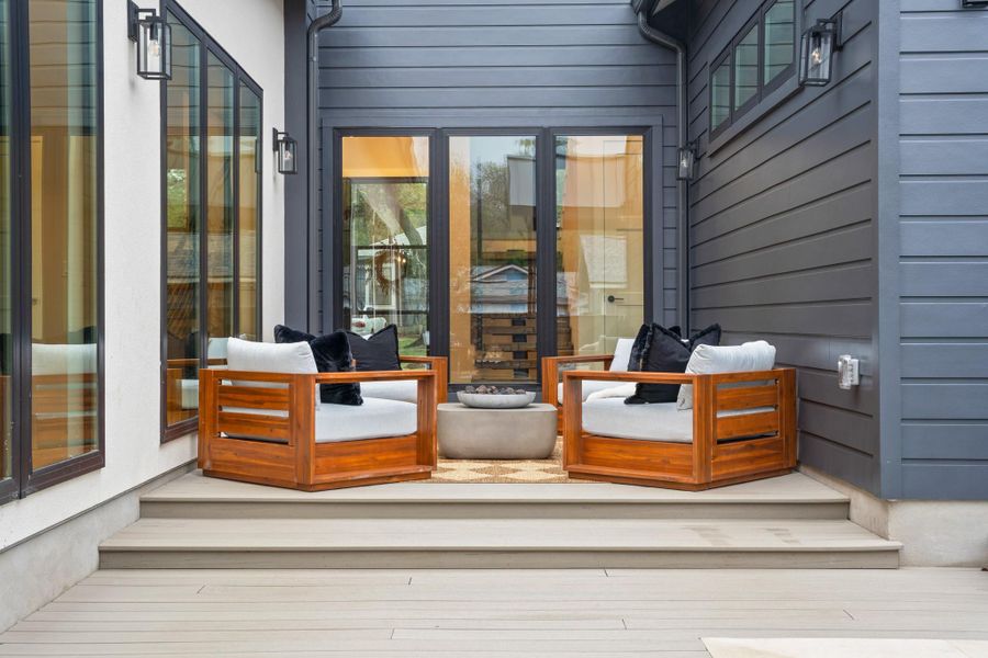 Wooden deck featuring an outdoor living space