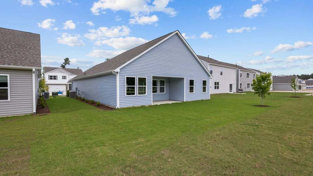 Exterior details and patio area of a home in West New Bern, New Bern (Image 21).