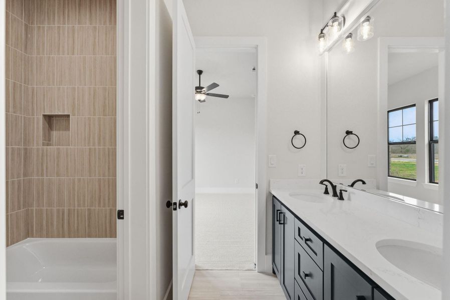 Furnished interior view inside a new home in High Meadow Estates, New Waverly (Image 8).