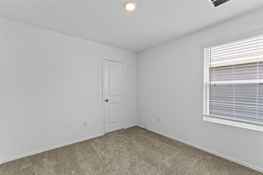 Spacious, unfurnished interior of a new home in Prairie Lakes, Buda (Image 33).