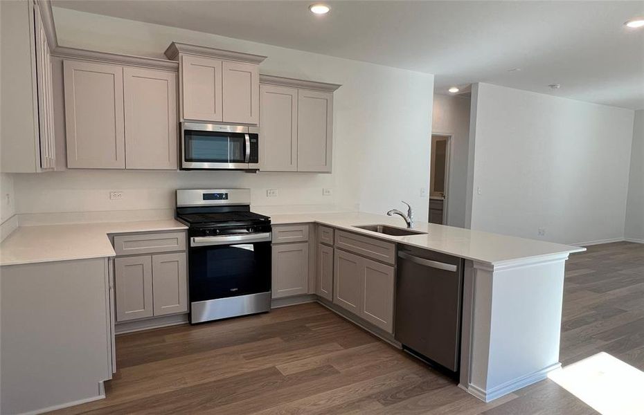 Spacious kitchen with abundant cabinet space *actual home