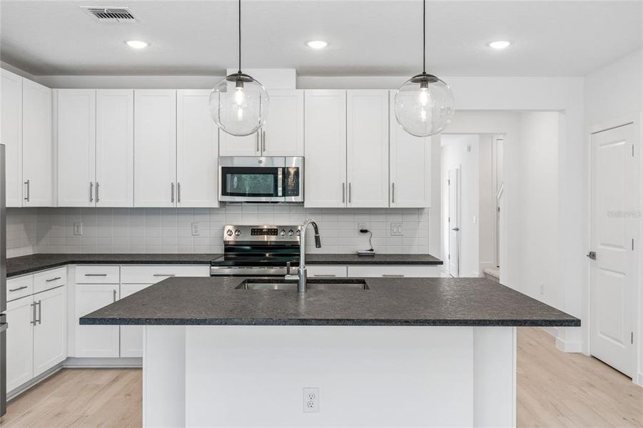 Furnished interior view inside a new home in Aspire at Canter Creek, Davenport (Image 4).