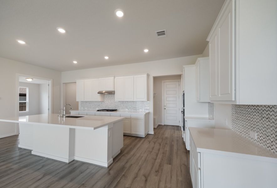 Representative furnished interior of a home built from the Englewood by Scott Felder Homes in Prominence, San Antonio (Image 5).