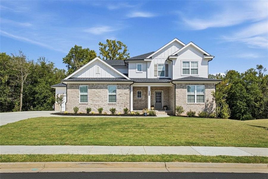 Front exterior of a new home in Conner Farm, Dawsonville, GA, highlighting curb appeal (Image 24).