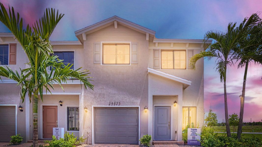 Representative exterior photo of a completed home built from the Topaz by D.R. Horton in Juniper Cove, Homestead, FL (Image 20).