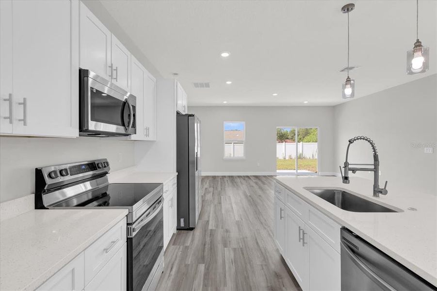 Furnished interior view inside a new home in , Ocala (Image 13).