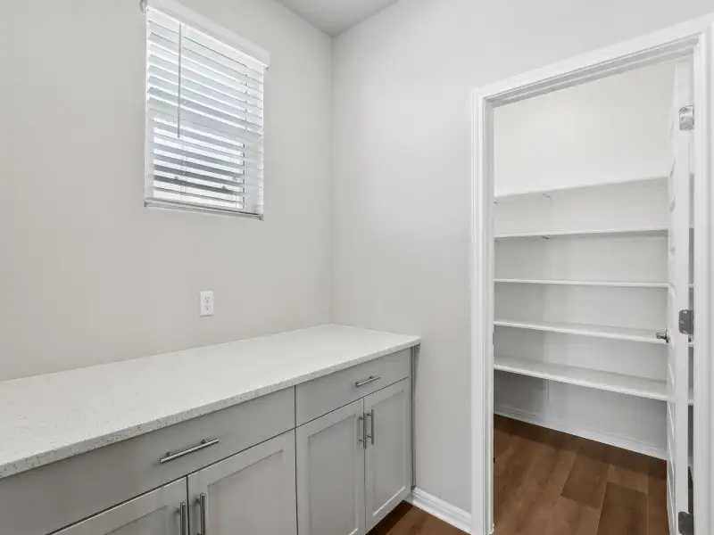 Furnished interior view inside a new home in Big Sky Ranch - Executive Collection, Dripping Springs (Image 3).