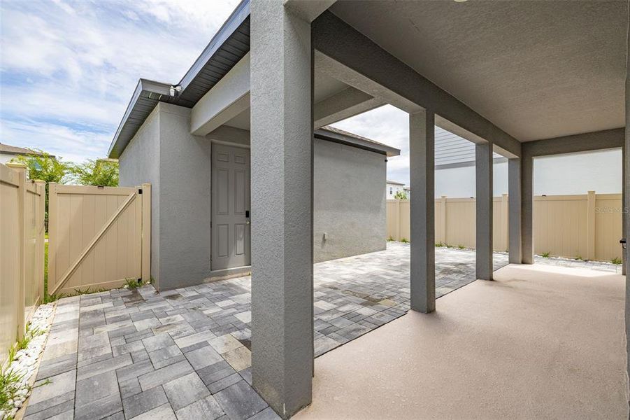 Exterior details and patio area of a home in Highland Ridge, Winter Garden (Image 27).