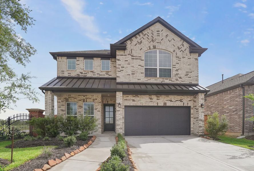 Representative exterior photo of a completed home built from the Sawyer by Chesmar Homes in Brookewater 45's, Rosenberg, TX (Image 14).