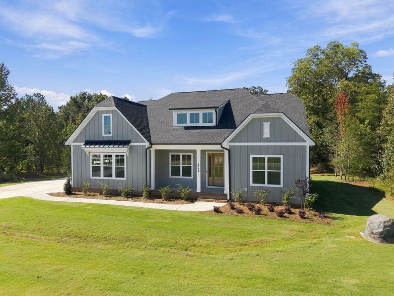Front exterior of a new home in Shepherds Trace, Clover, SC, highlighting curb appeal (Image 28). Front exterior of a new home in Shepherds Trace, Clover, SC, highlighting curb appeal (Image 28).