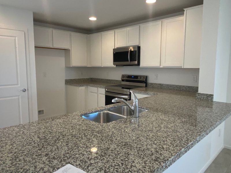 Furnished interior view inside a new home in Wildera – Crest Series, San Tan Valley (Image 4).
