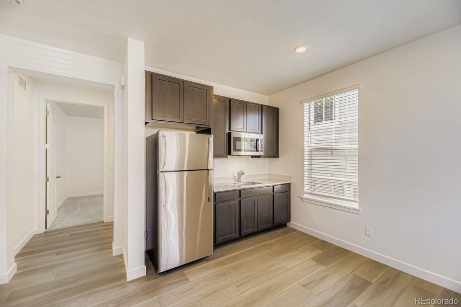 Furnished interior view inside a new home in Newlin Crossing: The Monarch Collection, Parker (Image 8).