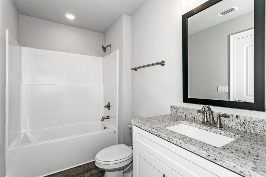 Image 54 representing the The Ruby by Herbst Homes in Buckeyes Landing, Navarre, FL.