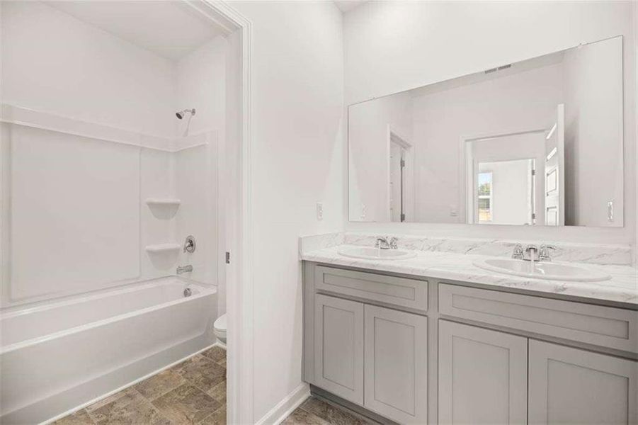 Furnished interior view inside a new home in Preserve at Dove Creek, Statham (Image 15).