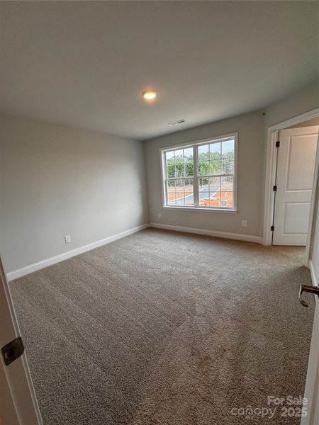 3rd bedroom with walk in closet