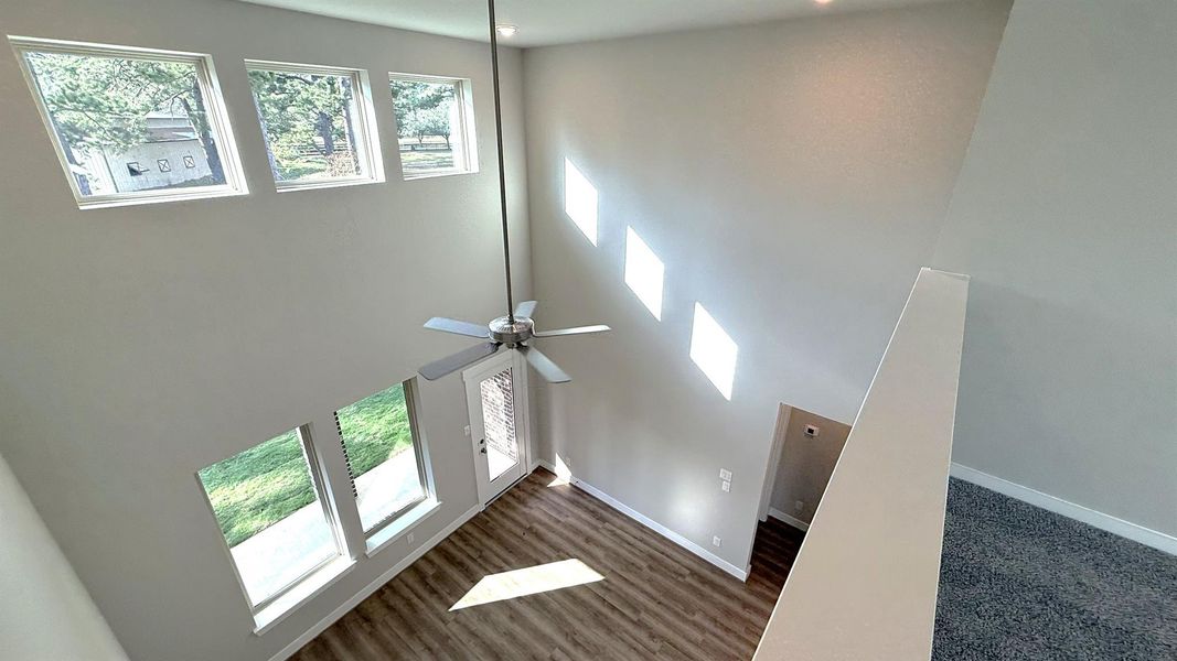 Picture expansive windows that invite natural light to dance through spacious living areas, creating a welcoming atmosphere perfect for gatherings or quiet moments of reflection.