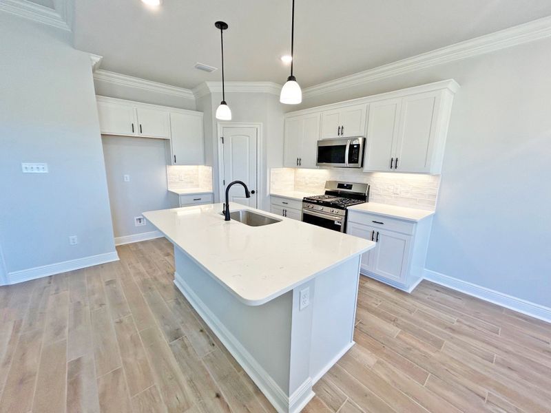 Furnished interior view inside a new home in The Bluffs at Lafayette, Freeport (Image 12).
