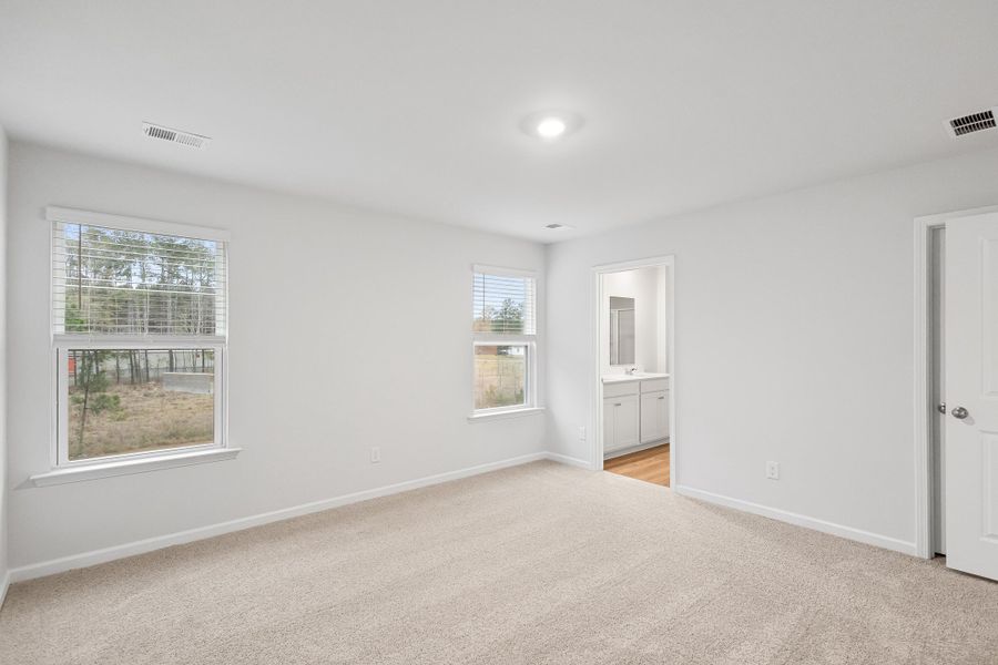 Spacious, unfurnished interior of a new home in The Cove at Mallard Crossing, Summerville (Image 20).