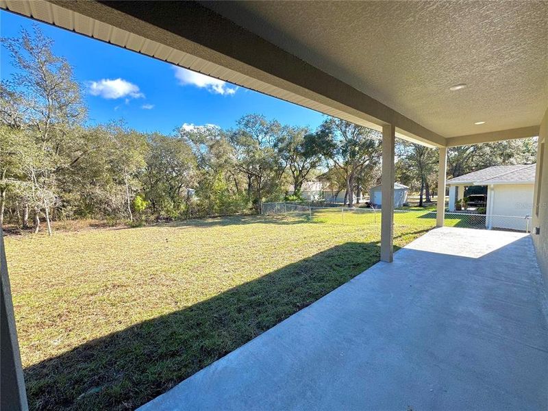 Exterior details and patio area of a home in , Citrus Springs (Image 20).