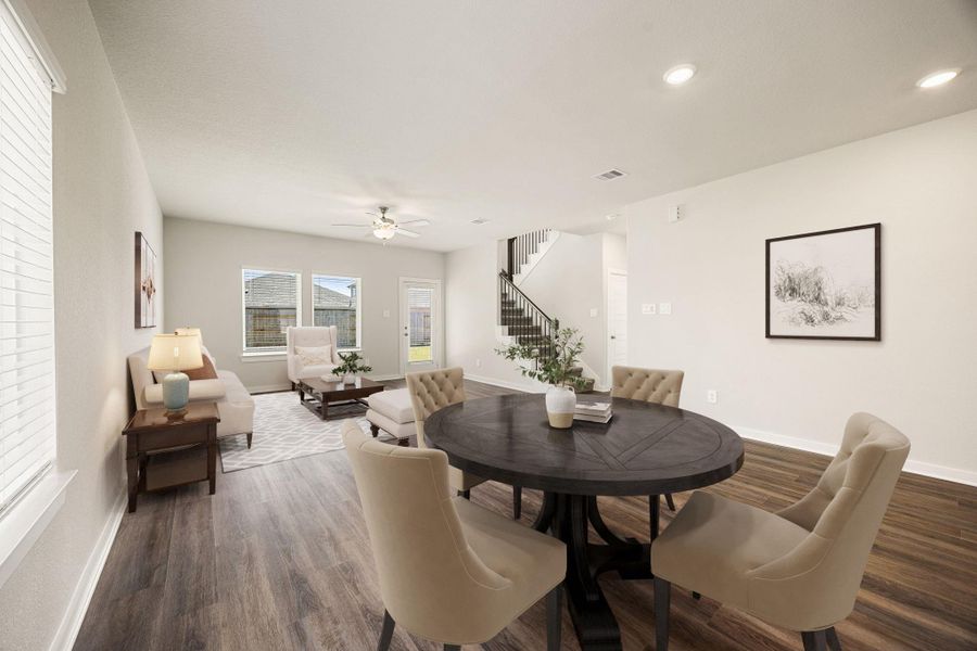 Create lasting memories with family and friends in this inviting dining room! It showcases high ceilings, recessed lighting, large window with blinds, custom paint, and stunning flooring. *Virtually Staged Create lasting memories with family and friends in this inviting dining room! It showcases high ceilings, recessed lighting, large window with blinds, custom paint, and stunning flooring. *Virtually Staged