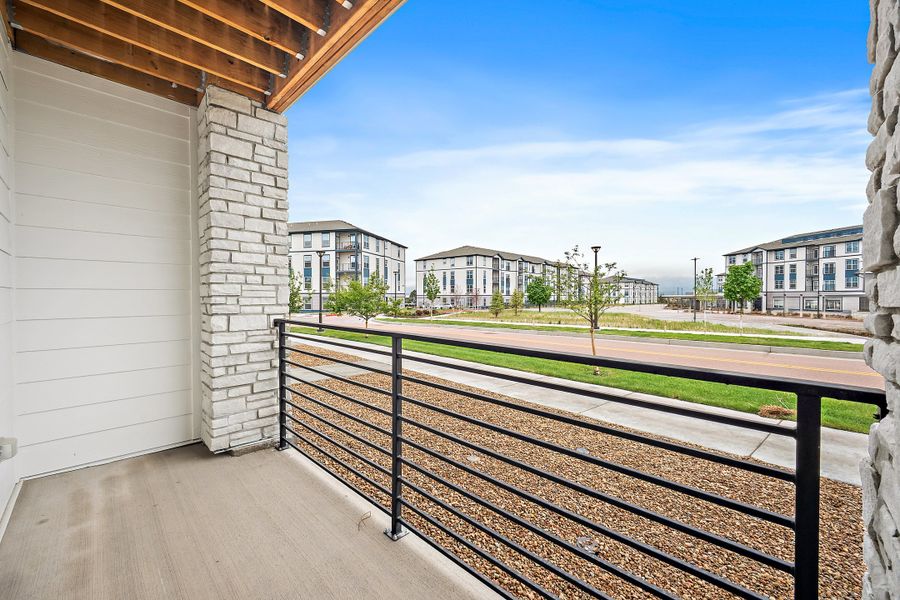Exterior details and patio area of a home in The Commons at Victory Ridge, Colorado Springs (Image 24).