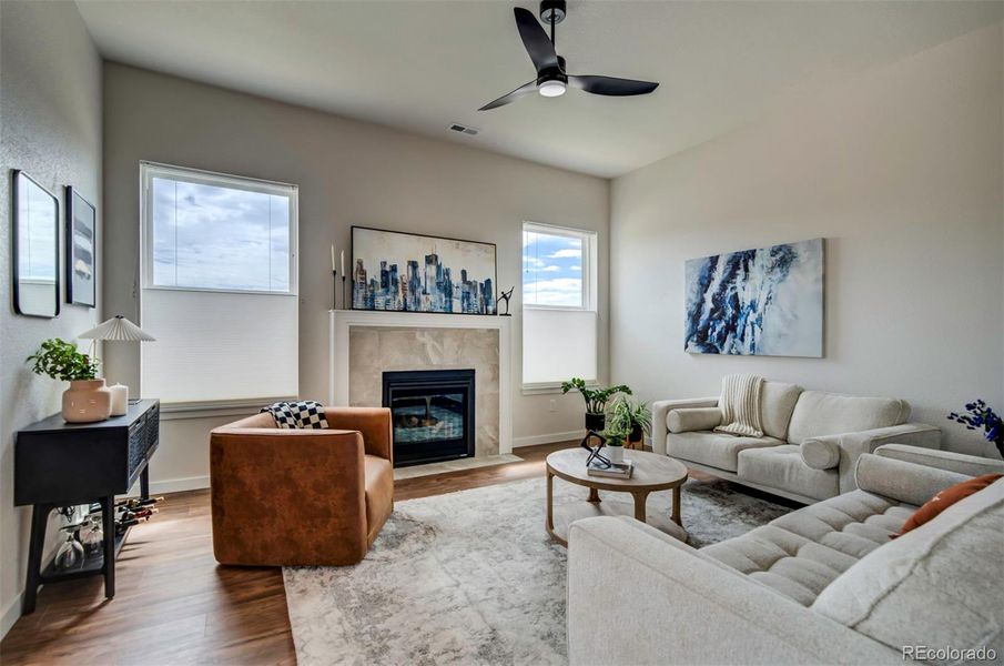 Living room has plenty of room for two couches or a sectional.