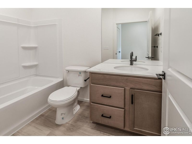Furnished interior view inside a new home in Bloom Trailblazer Collection - Single Family Homes, Fort Collins (Image 11).